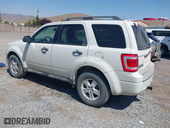 2011 Ford Escape XLT z VIN 1FMCU9DGXBKA93027, wystawiony jako IAAI lot #42712059 z przebiegiem 121 820 mil mil oraz . Historia ofert i sprzedaży dostępna na DreamBid. Obrazek 3.