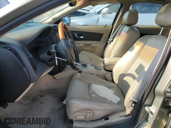 2007 Cadillac CTS with VIN 1G6DP577470108518, listed as a Copart auction lot 70893714 with 126,266 mi miles and Salvage Title. Bid and sale history available at carsss.com. Image 7.