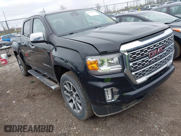 2021 GMC Canyon 4WD Denali with VIN 1GTG6EEN6M1260580, listed as a IAAI auction lot 41918693 with 52,085 mi miles. Bid and sale history available at carsss.com. Image 1.