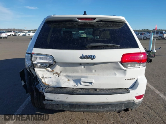 2019 Jeep Grand Cherokee Laredo E with VIN 1C4RJFAG7KC694674, listed as a IAAI auction lot 41591678 with 61,144 mi miles. Bid and sale history available at carsss.com. Image 16.