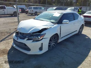 2014 Scion tC z VIN JTKJF5C74E3072410, wystawiony jako IAAI lot #41810965 z przebiegiem 147 164 mil mil oraz . Historia ofert i sprzedaży dostępna na DreamBid. Obrazek 18.