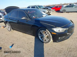 2014 BMW 3 Series 328i with VIN WBA3C1C5XEK112525, listed as a IAAI auction lot 41344289 with 114,525 mi miles. Bid and sale history available at carsss.com. Image 1.