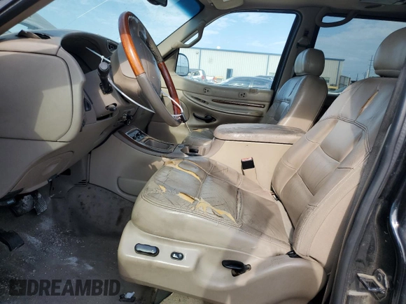 2002 Lincoln Navigator z VIN 5LMFU28R32LJ14694, wystawiony jako Copart lot #66689144 z przebiegiem 212 346 mil mil oraz Szkoda całkowita • Salvage title. Historia ofert i sprzedaży dostępna na DreamBid. Obrazek 7.