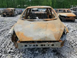 2018 Ford Focus SE z VIN 1FADP3FE4JL265608, wystawiony jako Copart lot #50029575 z przebiegiem Nie podano mil oraz Szkoda całkowita • Salvage title. Historia ofert i sprzedaży dostępna na DreamBid. Obrazek 5.