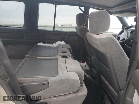 2000 Isuzu Trooper S with VIN JACDJ58X9Y7J18322, listed as a Copart auction lot 42444695 with 149,799 mi miles and Salvage title. Bid and sale history available at DreamBid. Image 11.