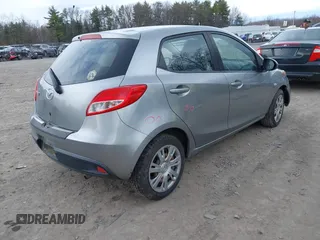 2013 Mazda Mazda2 Sport with VIN JM1DE1KY5D0159551, listed as a IAAI auction lot 41903043 with 107,858 mi miles. Bid and sale history available at carsss.com. Image 4.