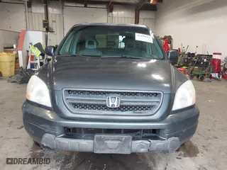 2005 Honda Pilot EX-L with RES with VIN 2HKYF18655H521175, listed as a IAAI auction lot 41490812 with 357,033 mi miles. Bid and sale history available at carsss.com. Image 13.
