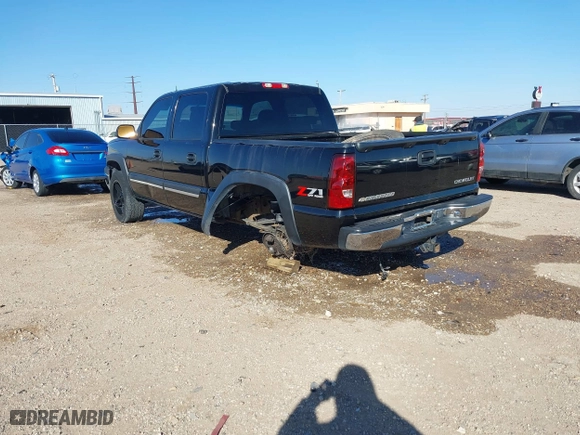 2005 Chevrolet Silverado 1500 LS with VIN 2GCEK13T551184097, listed as a IAAI auction lot 41598653 with 218,461 mi miles. Bid and sale history available at carsss.com. Image 3.