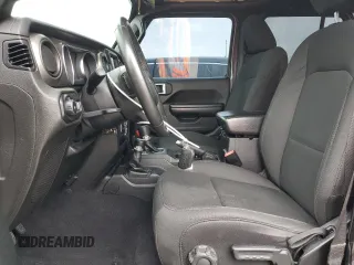 2019 Jeep Wrangler Unlimited Sport S with VIN 1C4HJXDG5KW535115, listed as a Copart auction lot 58404545 with 95,491 mi miles and Salvage title. Bid and sale history available at DreamBid. Image 7.