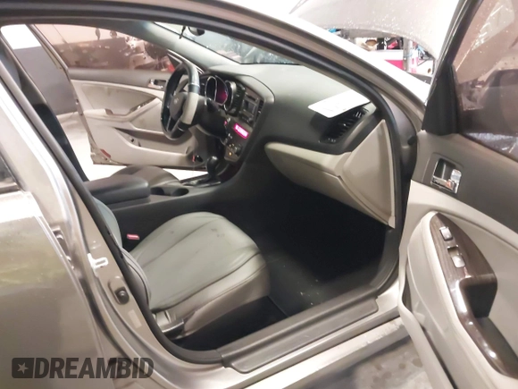2013 Kia Optima EX with VIN 5XXGN4A74DG165525, listed as a IAAI auction lot 42405482 with 132,820 mi miles and . Bid and sale history available at DreamBid. Image 5.