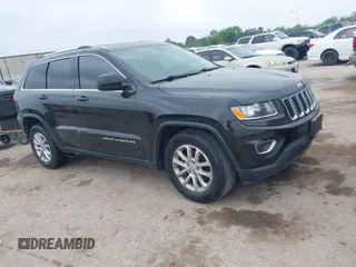 2015 Jeep Grand Cherokee Altitude with VIN 1C4RJEAG3FC944427, listed as a IAAI auction lot 41929483 with 128,114 mi miles. Bid and sale history available at carsss.com. Image 1.