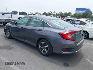 2020 Honda Civic LX z VIN 2HGFC2F60LH596396, wystawiony jako IAAI lot #42354812 z przebiegiem 62 082 mil mil oraz . Historia ofert i sprzedaży dostępna na DreamBid. Obrazek 3.