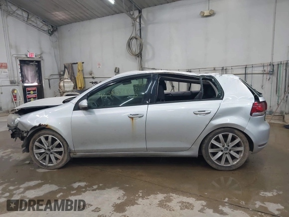 2012 Volkswagen Golf TDI with VIN WVWNM7AJ8CW333137, listed as a IAAI auction lot 42585466 with 213,587 mi miles and . Bid and sale history available at DreamBid. Image 14.