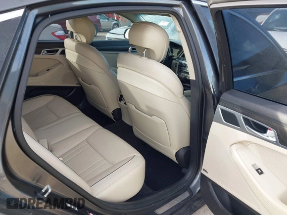 2017 Genesis G80 5.0L Ultimate with VIN KMHGN4JF0HU207725, listed as a IAAI auction lot 40953010 with 84,738 mi miles. Bid and sale history available at carsss.com. Image 8.