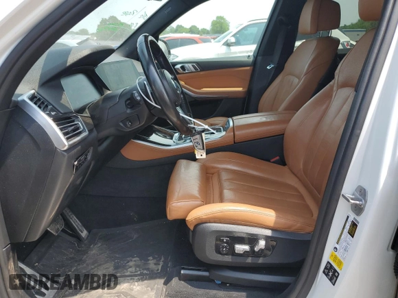 2019 BMW X5 xDrive40i with VIN 5UXCR6C51KLL23163, listed as a Copart auction lot 58598455 with 151,698 mi miles and Salvage title. Bid and sale history available at DreamBid. Image 7.
