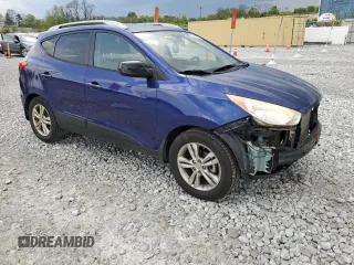 2010 Hyundai Tucson GLS with VIN KM8JU3AC9AU113714, listed as a Copart auction lot 55263765 with 193,175 mi miles and Salvage Title. Bid and sale history available at DreamBid. Image 4.