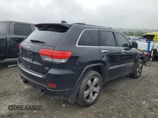 2015 Jeep Grand Cherokee Overland with VIN 1C4RJFCT2FC762573, listed as a Copart auction lot 59123275 with 229,128 mi miles and Salvage title. Bid and sale history available at DreamBid. Image 3.