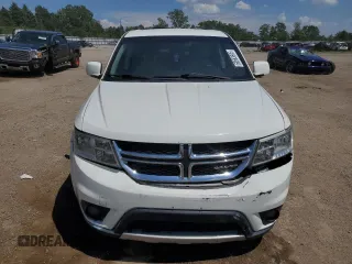 2015 Dodge Journey SXT with VIN 3C4PDCBG5FT628212, listed as a Copart auction lot 60663695 with 145,024 mi miles and Salvage title. Bid and sale history available at DreamBid. Image 5.