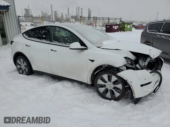 2022 Tesla Model Y Long Range with VIN 7SAYGDEE4NF433617, listed as a Copart auction lot 42585975 with 93,949 mi miles and Salvage Title. Bid and sale history available at carsss.com. Image 4.