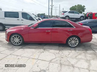 2015 Cadillac CTS Luxury AWD with VIN 1G6AX5SX2F0112852, listed as a IAAI auction lot 42398611 with 70,253 mi miles and . Bid and sale history available at DreamBid. Image 14.
