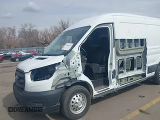 2020 Ford Transit Cargo with VIN 1FTBR2CG1LKB43034, listed as a IAAI auction lot 41668193 with 56,827 mi miles and . Bid and sale history available at DreamBid. Image 6.