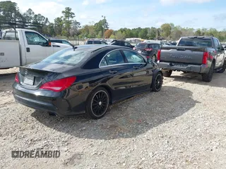 2016 Mercedes-Benz CLA with VIN WDDSJ4EB4GN313644, listed as a IAAI auction lot 41876273 with 113,847 mi miles. Bid and sale history available at carsss.com. Image 4.