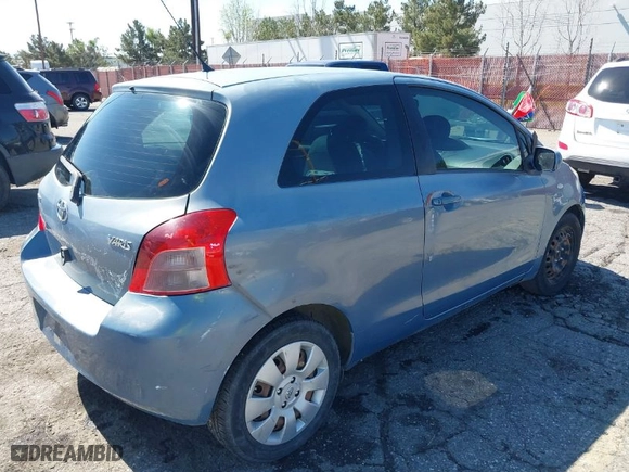 2008 Toyota Yaris with VIN JTDJT923085205341, listed as a IAAI auction lot 41762601 with 218,299 mi miles. Bid and sale history available at carsss.com. Image 4.
