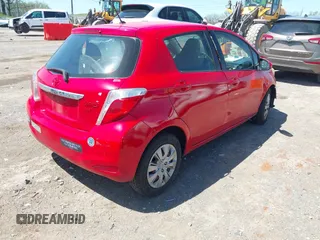 2012 Toyota Yaris L with VIN JTDKTUD32CD536389, listed as a IAAI auction lot 42020928 with 138,379 mi miles. Bid and sale history available at carsss.com. Image 4.