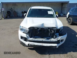 2021 Toyota Tacoma SR z VIN 3TMCZ5AN5MM417384, wystawiony jako IAAI lot #41617168 z przebiegiem 55 969 mil mil oraz . Historia ofert i sprzedaży dostępna na DreamBid. Obrazek 13.