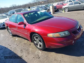 2003 Pontiac Bonneville SLE z VIN 1G2HY52K534159881, wystawiony jako IAAI lot #41604988 z przebiegiem 227 097 mil mil oraz . Historia ofert i sprzedaży dostępna na DreamBid. Obrazek 1.