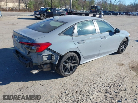2022 Honda Civic Sport z VIN 2HGFE2F50NH601567, wystawiony jako IAAI lot #40880687 z przebiegiem 16 587 mil mil oraz . Historia ofert i sprzedaży dostępna na DreamBid. Obrazek 4.