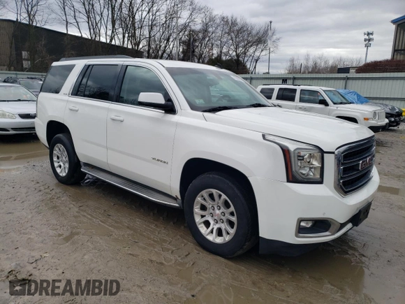 2015 GMC Yukon SLE with VIN 1GKS2AKC0FR107168, listed as a Copart auction lot 47882895 with 149,448 mi miles and Clean Title. Bid and sale history available at carsss.com. Image 4.