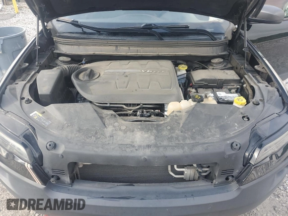 2019 Jeep Cherokee Trailhawk with VIN 1C4PJMBX9KD183116, listed as a Copart auction lot 58518265 with 124,258 mi miles and Salvage title. Bid and sale history available at DreamBid. Image 12.