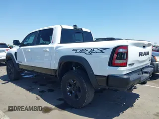 2022 Ram 1500 TRX with VIN 1C6SRFU95NN245954, listed as a IAAI auction lot 42032210 with 30,870 mi miles and . Bid and sale history available at DreamBid. Image 3.