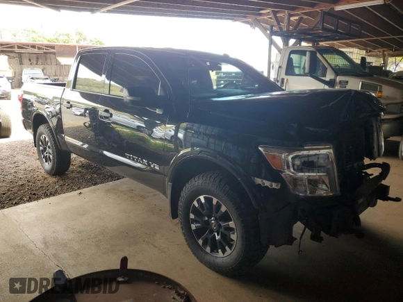2018 Nissan Titan Pro-4X z VIN 1N6AA1E51JN531463, wystawiony jako Copart lot #52995885 z przebiegiem 62 873 mil mil oraz Szkoda całkowita • Salvage title. Historia ofert i sprzedaży dostępna na DreamBid. Obrazek 4.