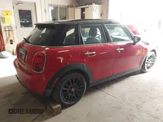 2020 MINI Hardtop 4 Door Cooper z VIN WMWXU7C07L2L48763, wystawiony jako IAAI lot #41948131 z przebiegiem 20 083 mil mil oraz . Historia ofert i sprzedaży dostępna na DreamBid. Obrazek 4.