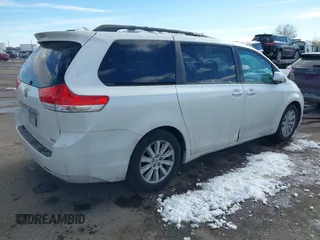 2011 Toyota Sienna XLE AAS with VIN 5TDYK3DC8BS045352, listed as a IAAI auction lot 41401955 with 142,492 mi miles and . Bid and sale history available at DreamBid. Image 4.
