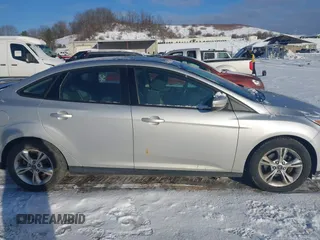 2012 Ford Focus SE with VIN 1FAHP3F27CL457213, listed as a IAAI auction lot 41303904 with 215,044 mi miles and . Bid and sale history available at DreamBid. Image 13.