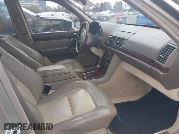 1996 Mercedes-Benz S with VIN WDBGA57E8TA318326, listed as a IAAI auction lot 42072979 with 97,504 mi miles and . Bid and sale history available at DreamBid. Image 5.