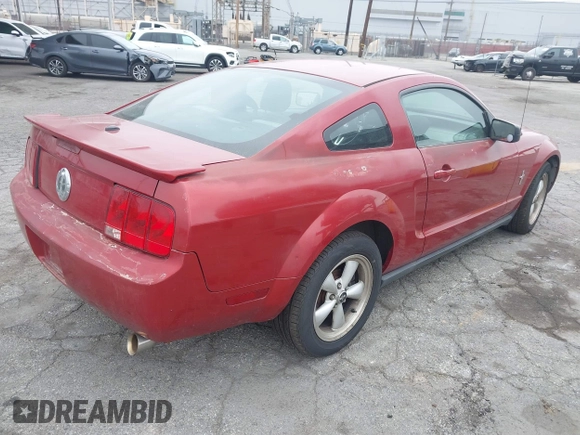 2008 Ford Mustang Deluxe with VIN 1ZVHT80N985100100, listed as a IAAI auction lot 42450593 with 164,853 mi miles and . Bid and sale history available at DreamBid. Image 4.
