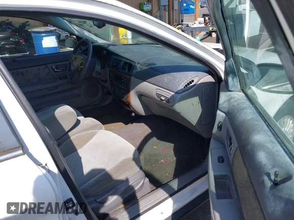 2002 Mercury Sable GS z VIN 1MEFM50U22G643733, wystawiony jako IAAI lot #42090195 z przebiegiem 119 940 mil mil oraz . Historia ofert i sprzedaży dostępna na DreamBid. Obrazek 5.