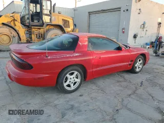 1998 Pontiac Firebird Firebird z VIN 2G2FS22K0W2201603, wystawiony jako Copart lot #79671704 z przebiegiem 309 203 mil mil oraz Czysty tytuł • Clean title. Historia ofert i sprzedaży dostępna na DreamBid. Obrazek 3.