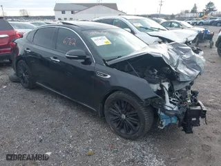 2018 Kia Optima SX with VIN 5XXGV4L28JG239557, listed as a IAAI auction lot 41136762 with 80,367 mi miles. Bid and sale history available at carsss.com. Image 1.