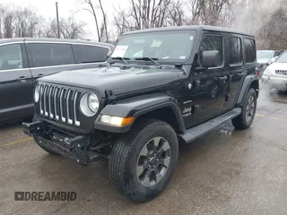 2018 Jeep Wrangler Unlimited Sahara z VIN 1C4HJXEN6JW332956, wystawiony jako IAAI lot #41477681 z przebiegiem 97 446 mil mil oraz . Historia ofert i sprzedaży dostępna na DreamBid. Obrazek 2.