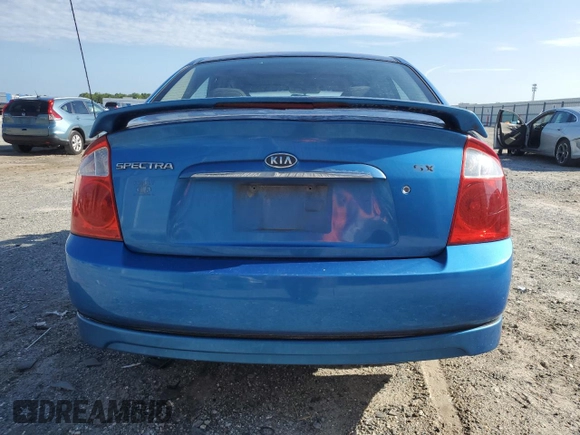 2005 Kia Spectra LX z VIN KNAFE121655113045, wystawiony jako Copart lot #61199595 z przebiegiem 156 310 mil mil oraz Szkoda całkowita • Salvage title. Historia ofert i sprzedaży dostępna na DreamBid. Obrazek 6.