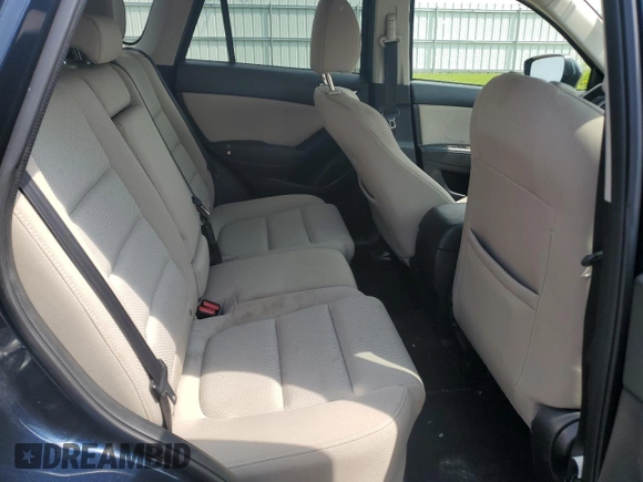 2016 Mazda CX-5 Touring с VIN JM3KE4CY8G0686101, выставлен на аукционе Copart как лот 60361215 с пробегом 126 804 миль миль и На запчасти • Non repairable. История ставок и продаж доступна на DreamBid. Изображение 10.
