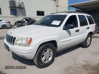 2003 Jeep Grand Cherokee Laredo with VIN 1J4GX48S43C518584, listed as a IAAI auction lot 42213094 with 163,743 mi miles and . Bid and sale history available at DreamBid. Image 18.
