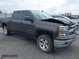 2014 Chevrolet Silverado 1500 LT with VIN 3GCUKREC7EG561639, listed as a IAAI auction lot 42020364 with 154,785 mi miles. Bid and sale history available at carsss.com. Image 1.