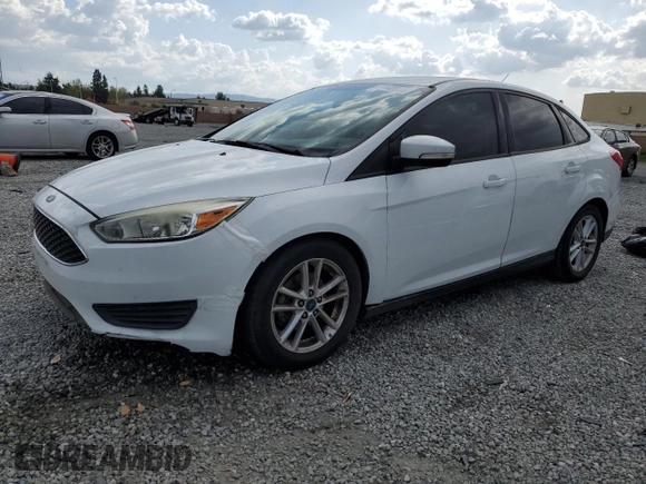 2016 Ford Focus SE with VIN 1FADP3F21GL284681, listed as a Copart auction lot 51140975 with 141,704 mi miles and Salvage Title. Bid and sale history available at DreamBid. Image 1.