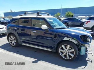 2017 MINI Countryman Cooper S z VIN WMZYT3C39H3D97769, wystawiony jako IAAI lot #42794779 z przebiegiem 126 880 mil mil oraz . Historia ofert i sprzedaży dostępna na DreamBid. Obrazek 1.